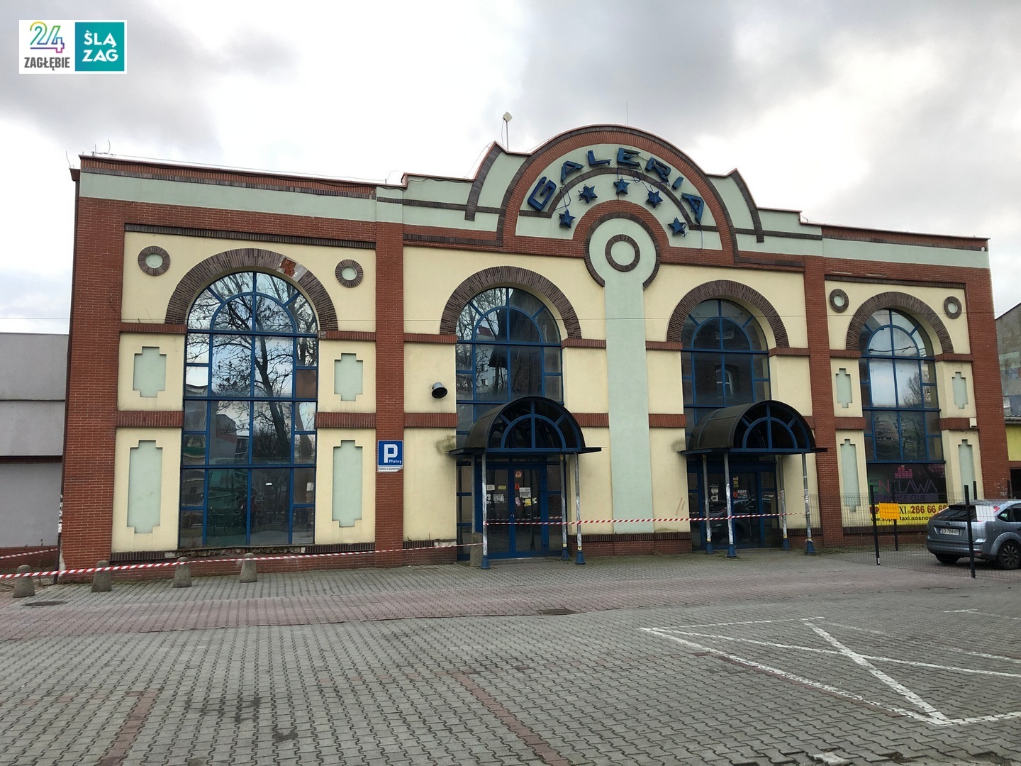 Sosnowiec. Ulice 1 Maja i Partyzantów. Dawne: przędzalnia Schoenow oraz huta szkła. Dawny budynek Domu Handlowego C. G. Schön 1 lutego 2025.
